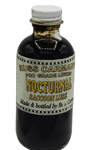 A screw-capped bottle labeled "Carman's Pro Grade Nocturnal Lure" contains dark liquid.