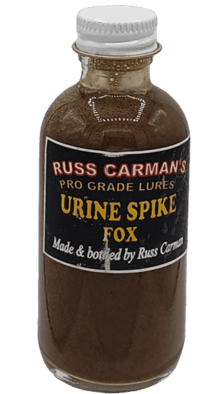 A small bottle labeled "Carman's Pro Grade Urine Spike Fox," with a metal cap.