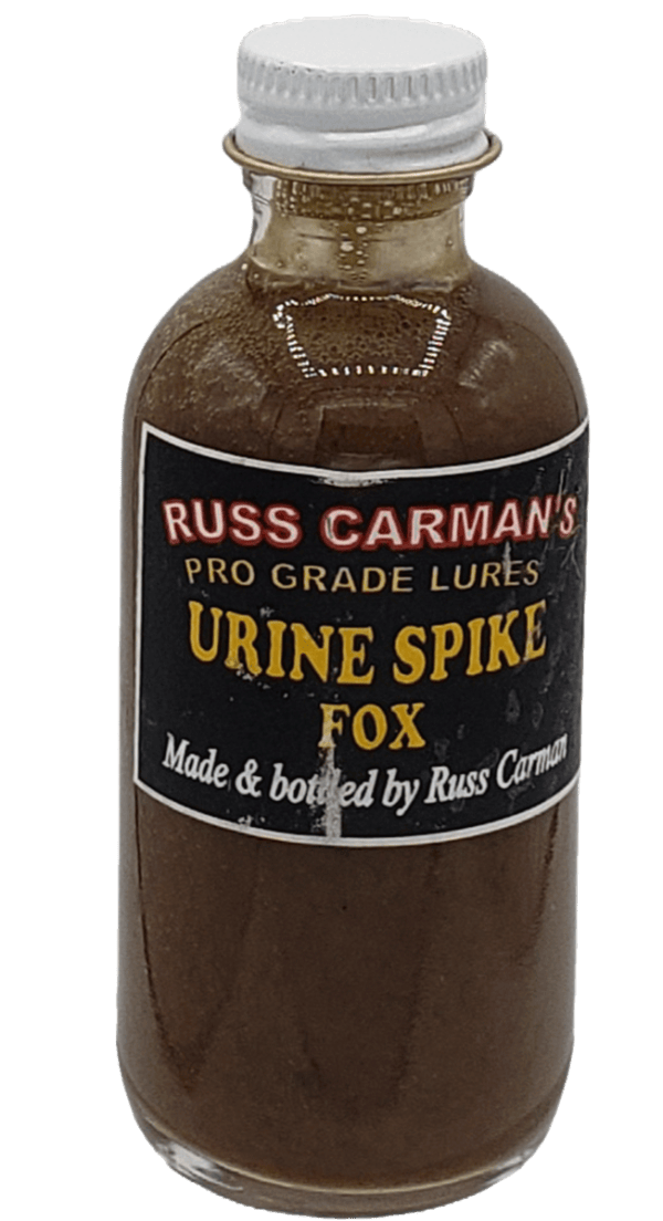 A small bottle labeled "Carman's Pro Grade Urine Spike Fox," with a metal cap.