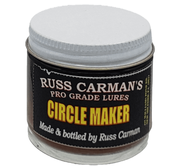 Jar of Carman's Pro Grade Circle Maker Lure, premium coyote lure with a white screw-on lid and black label.