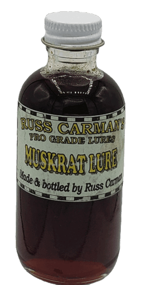 Carman's Pro Grade Muskrat Lure comes in a bottle with dark liquid and a white cap.