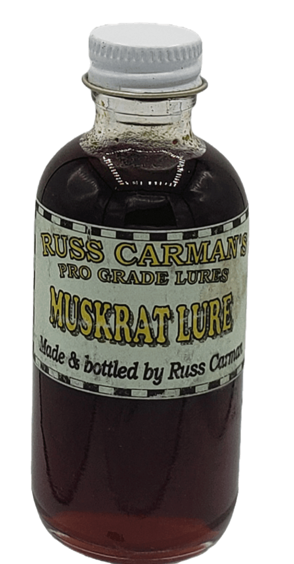 Carman's Pro Grade Muskrat Lure comes in a bottle with dark liquid and a white cap.
