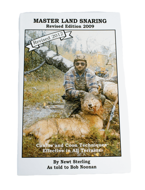 Cover of "Newt Sterling - Master Land Snaring" with a man and a snared animal in nature.