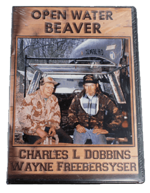 Two men in camouflage sit outdoors using "Charles Dobbins & Wayne Freebersyser - Open Water Beaver Trapping.