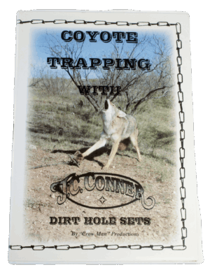 Book cover of "J.C. Conner - Coyote Trapping with Dirt Hole Sets," featuring a wild coyote.