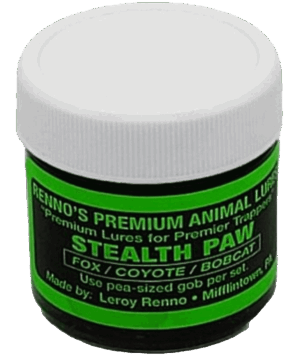 Jar of Stealth Paw by Renno's Lure for fox, coyote, and bobcat trapping with green and black packaging.