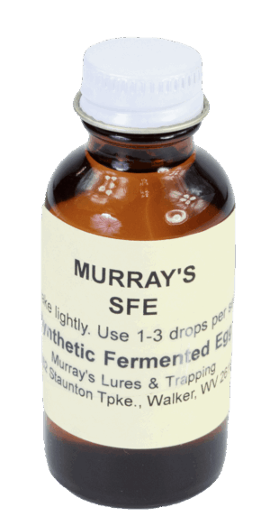A small brown bottle labeled "Murray's SFE Lure" for synthetic fermented egg trapping.