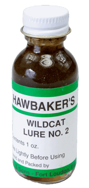 A 1 oz brown bottle labeled "Hawbaker's Wildcat Lure No. 2," with white and green text, perfect for trapping lure.