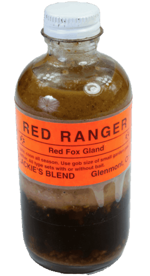 A "Blackie's Red Ranger Lure" bottle with layered liquid and a white screw cap, perfect for trapping lure enthusiasts.
