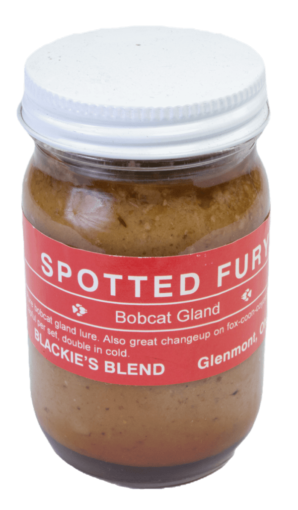Jar of Blackie's Spotted Fury Lure with a red label, ideal for trapping.