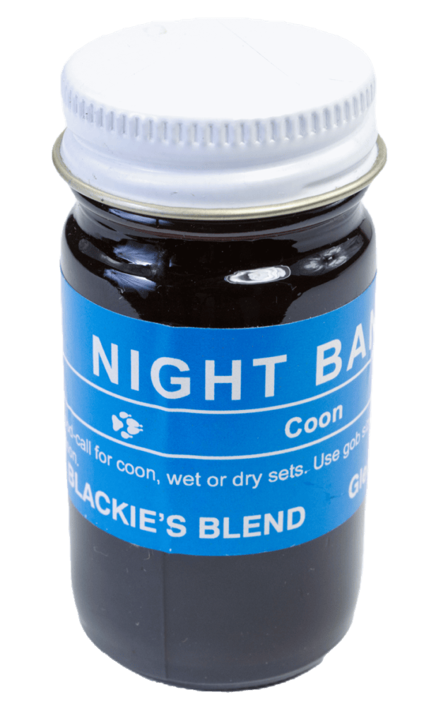 A jar labeled "Blackie's Night Bandit Lure" contains a dark liquid for trapping wildlife.