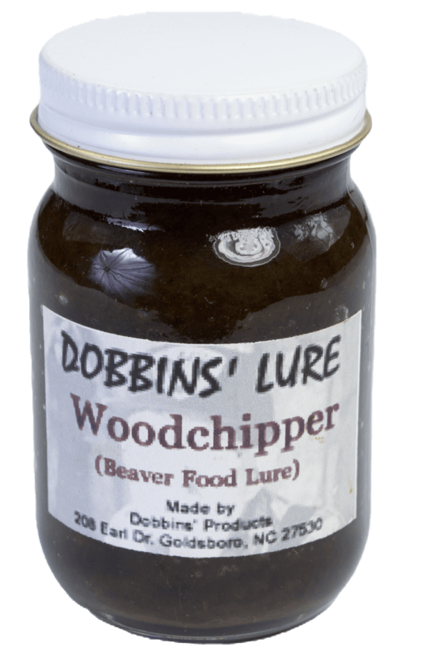 A jar of Dobbins' Woodchipper Lure, labeled "Beaver Food," from Goldsboro, NC.