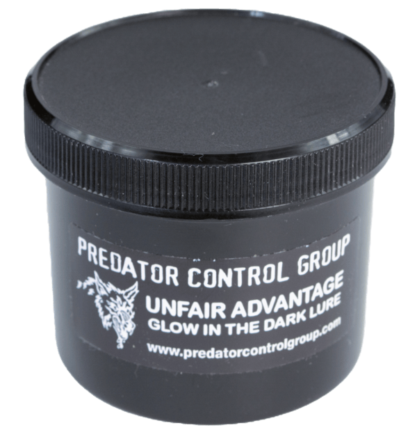 Black container labeled "PCG Unfair Advantage Lure, Glow in the Dark Trapping Lure.
