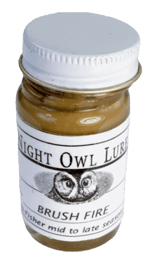 A small glass jar labeled "Night Owl Brush Fire Lure" with an owl design, perfect for night trapping.