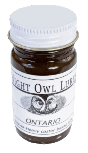 A small jar of "Night Owl Ontario Lure" with an owl graphic, featuring a beaver-heavy trapping formula.