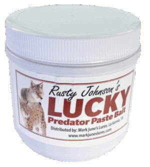 White container labeled "Rusty Johnson's Lucky Predator Paste Bait" featuring bobcat and lynx images for coyote bait.