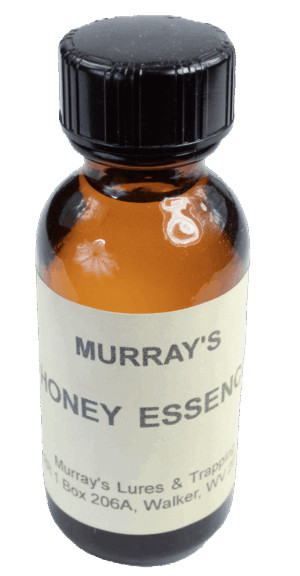 Murray's Honey Essence Oil: Small amber bottle with black cap, from Murray's Lures & Trapping Supplies, Walker, WV.