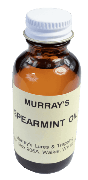 Small brown glass bottle labeled "Murray's Spearmint Essence Oil" with a white cap.