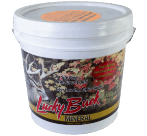 White "Lucky Buck Mineral" bucket with deer and autumn leaves design, marketed as a deer attractor.