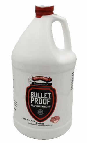 Gallon jug with a red cap labeled "Bullet Proof Trap & Snare Dip" from Murray's Lures & Trapping, used for trapping.