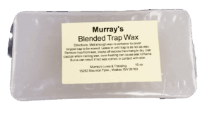 Clear-packaged Murray's Blended Trap Wax with instructions and contact info on label.