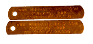 Two Printed Copper Trap Tags with MurraysLures.com contact info, phone, and address in Walker, WV 26180.