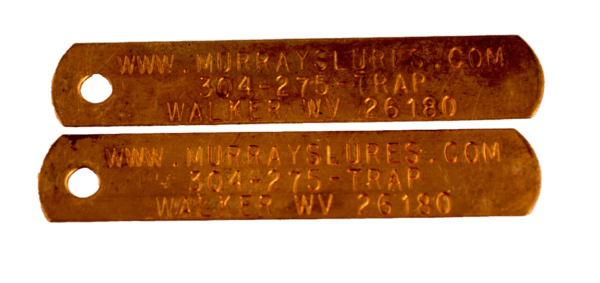 Two Printed Copper Trap Tags with MurraysLures.com contact info, phone, and address in Walker, WV 26180.