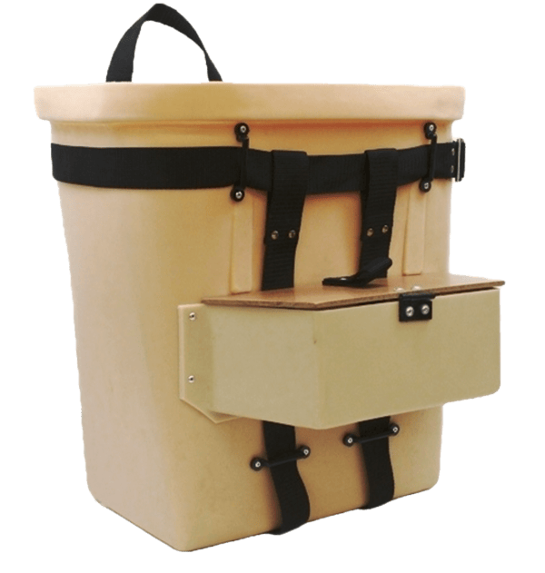A beige 18" Fiber Tuff Pack Basket with black straps and a side attached lure pouch for carrying.