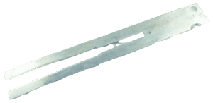 The Mityling Trap Bedder is a flat, elongated metal tool with two prongs and a hole at one end.