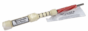A Sullivans Trap Pan Tester with a white handle, red tip, and plastic wrap to measure trap pan tension.